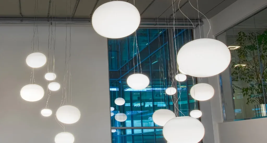 Gilbert pendant light by Panzeri is a contemporary pendant light made of full blown glass lamp shade and is suitable for hospitality, contract and residential settings
