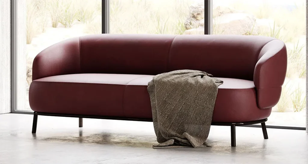 Juliet sofa is a contemporary upholstered sofa with fabric and leather finishes suitable for contract, hospitality and residential projects