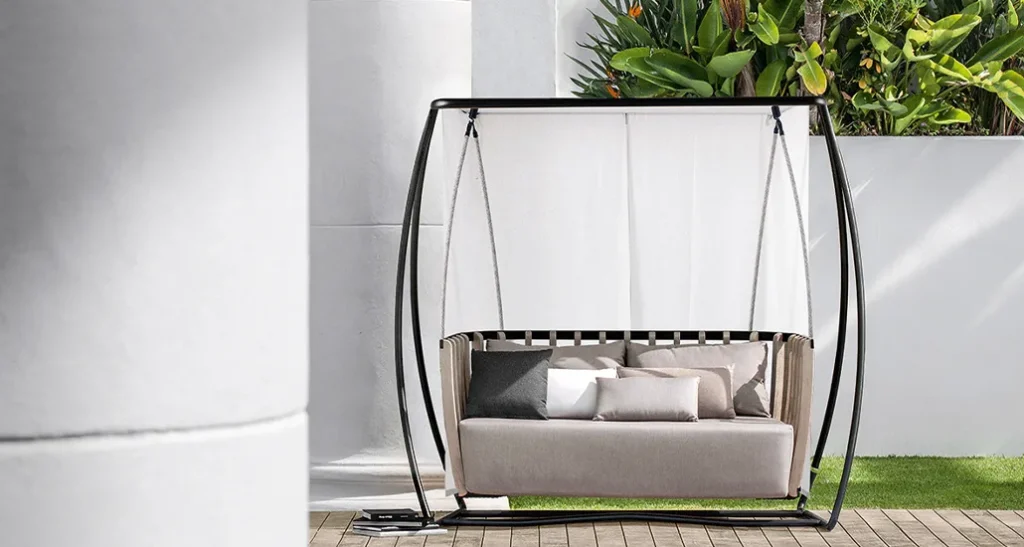 Swing porch sofa swing sofa is an outdoor swing made of teak and aluminium suitable for hospitality and contract spaces