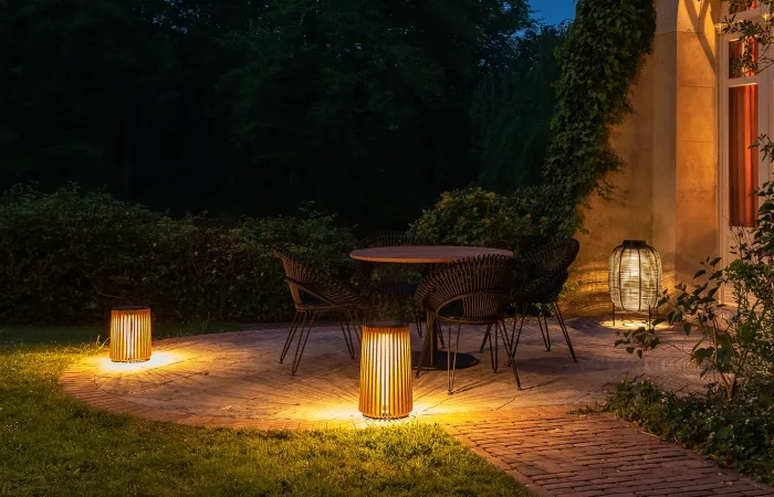 maya lamp with roxy chiar and bistro table in garden