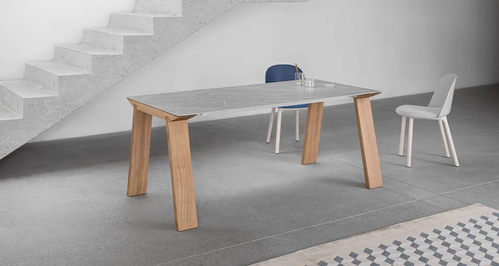 Artu table is a contemporary minimalist dining table with oak legs suitable for residential and hospitality projects