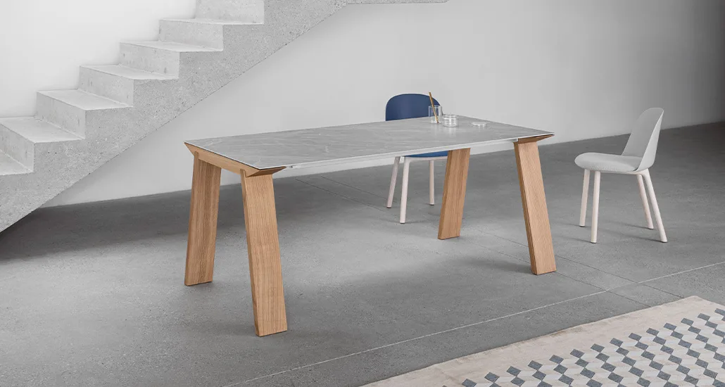 artu table is a contemporary minimalist dining table with oak legs suitable for residential and hospitality projects