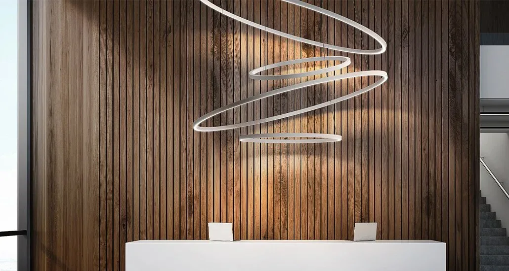 brookyln round suspension lamp against a wooden paneled wall