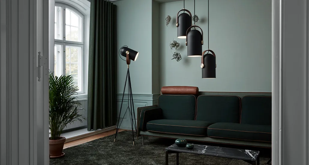 Carronade floor lamp by LE KLINT is a contemporary LED high floor lamp which provides directional light and is suitable for hospitality and residential lighting