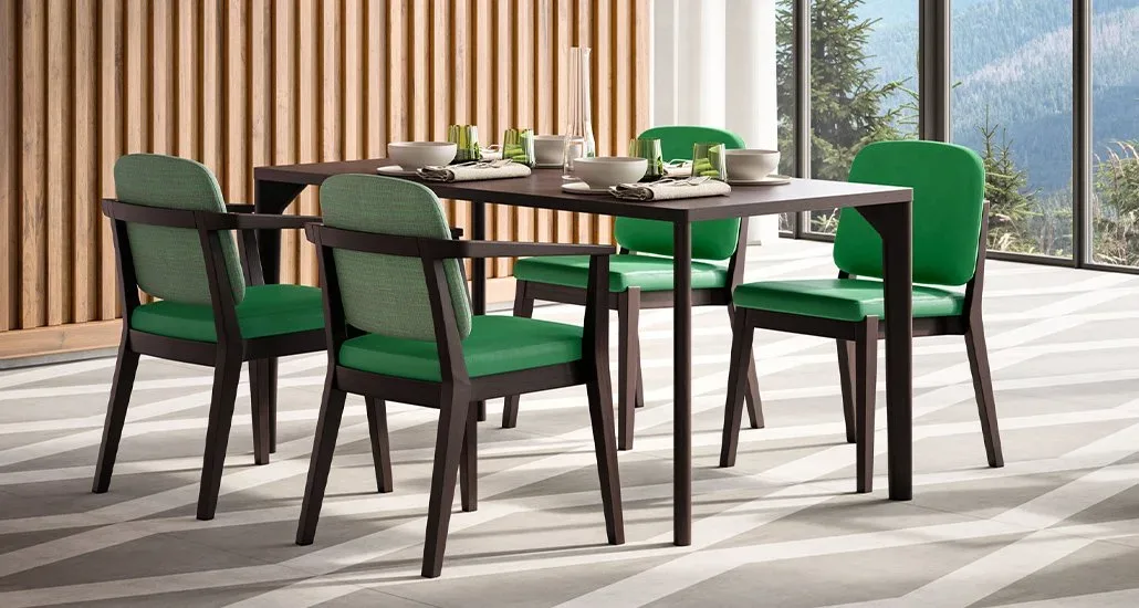 chelsea dining chair in beautiful green upholstery for the seat and backrest and solid ashwood all at the dining table