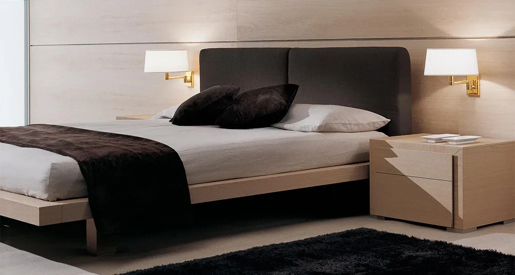 Classic wall lamp is a contemporary wall lamp with fabric lampshade and brass holder and is suitable for hospitalitym contract and residential projects