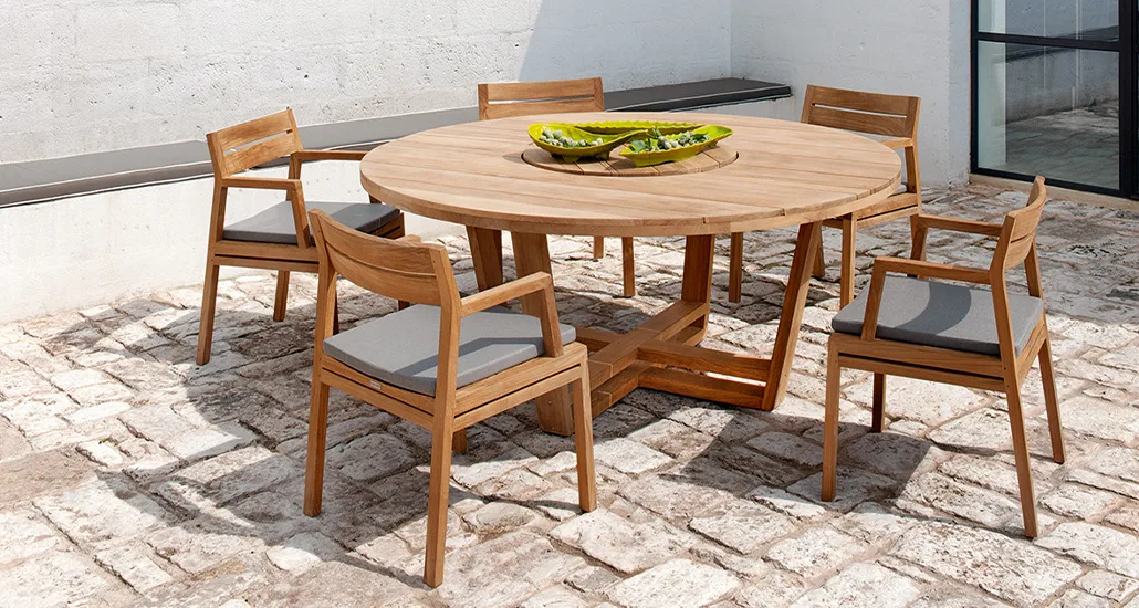 Costes dining table is an outdoor sustainable teak dining table suitable for hospitality and contract settings