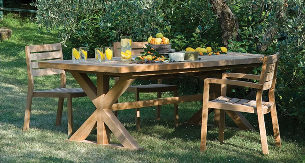 Cronos dining table is a contemporary outdoor sustainable teak dining table suitable for hospitality and contract spaces