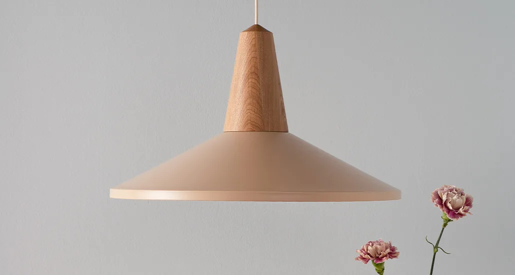 Eikon shell pendant is a contemporary pendant lamp with oak and steel finish suitable for hospitality and contact projects or spaces
