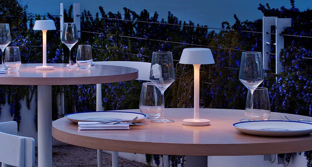 firefly in the sky by panzeri is a led battery operated rechargeable outdoor table lamp suitable for hospitality areas