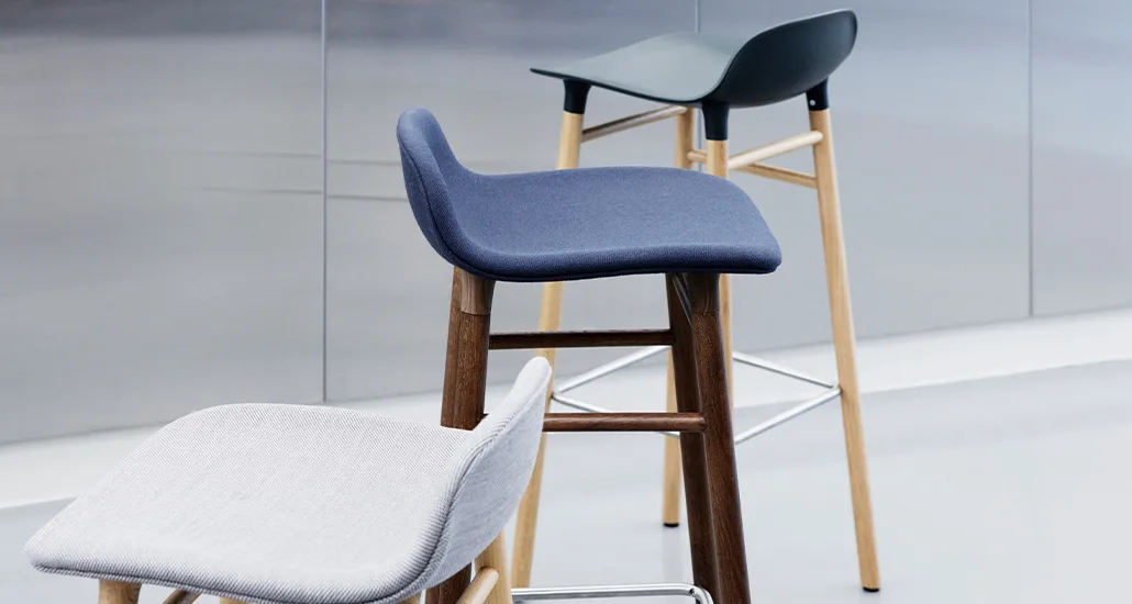 form bar stool by normann copenhagen is suitable for kitchen, bar counters and comes in oak or walnut legs with polypropylene seat