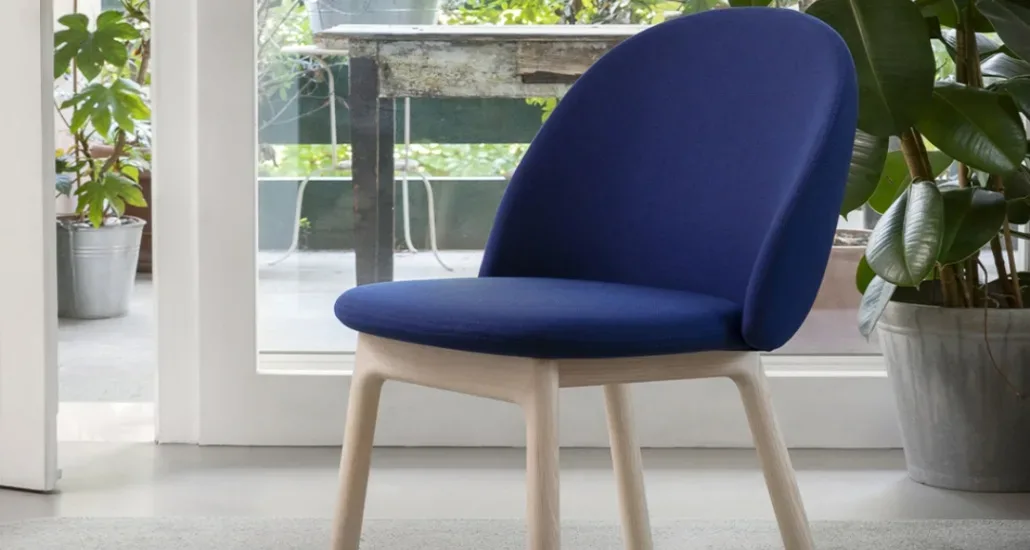 Iola chair is a contemporary upholstered minimalist dining chair with polyurethane frame suitable for office and hospitality projects