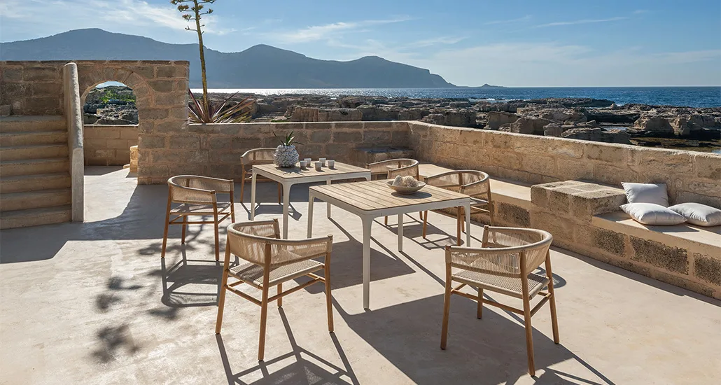 Kilt Dining Chair is a contemporary outdoor dining chair with teak legs, rope seat and is suitable for hospitality and contract projects