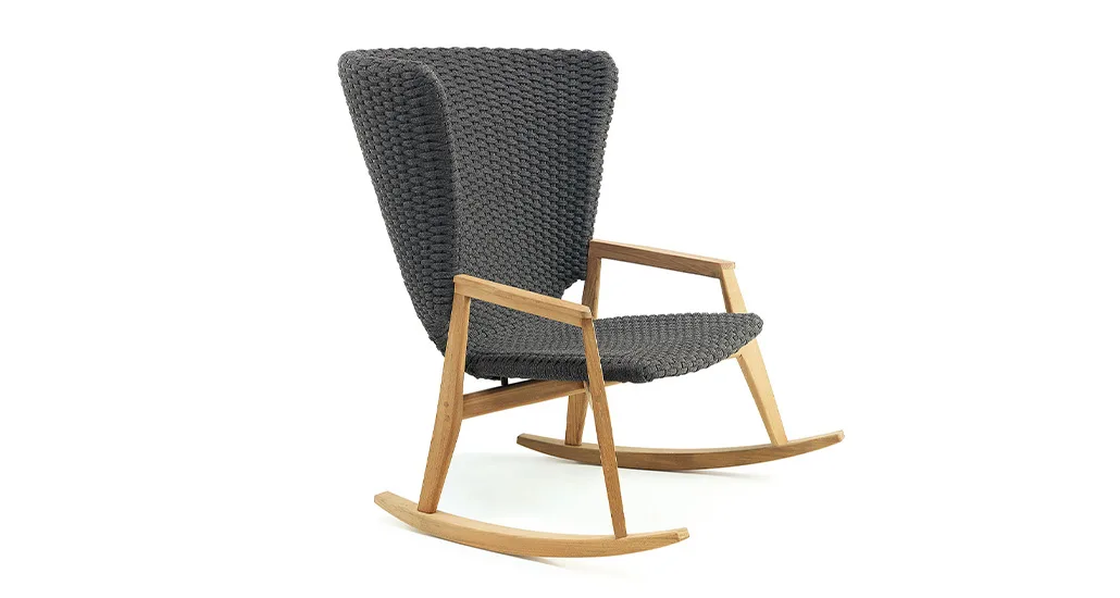 Knit Rocking Chair is a contemporary outdoor chair with rope seat and teak armrest and base. The Knit Rocking Armchair is best suitable for contract and hospitality projects.