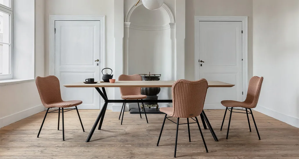 Lily Dining Chair is a contemporary dining chair with Lloyd Loom seat and steel or oak base and is suitable for contract and hospitality projects