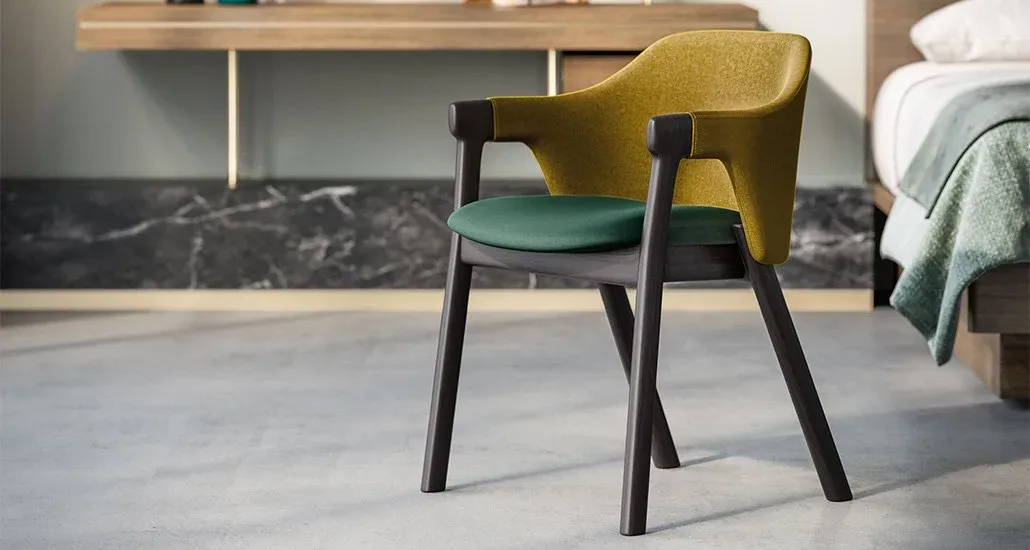 Loden dining armchair with a backrest of yellow shade and a cushioned seat of a green shade all supported by strong dark colored wood