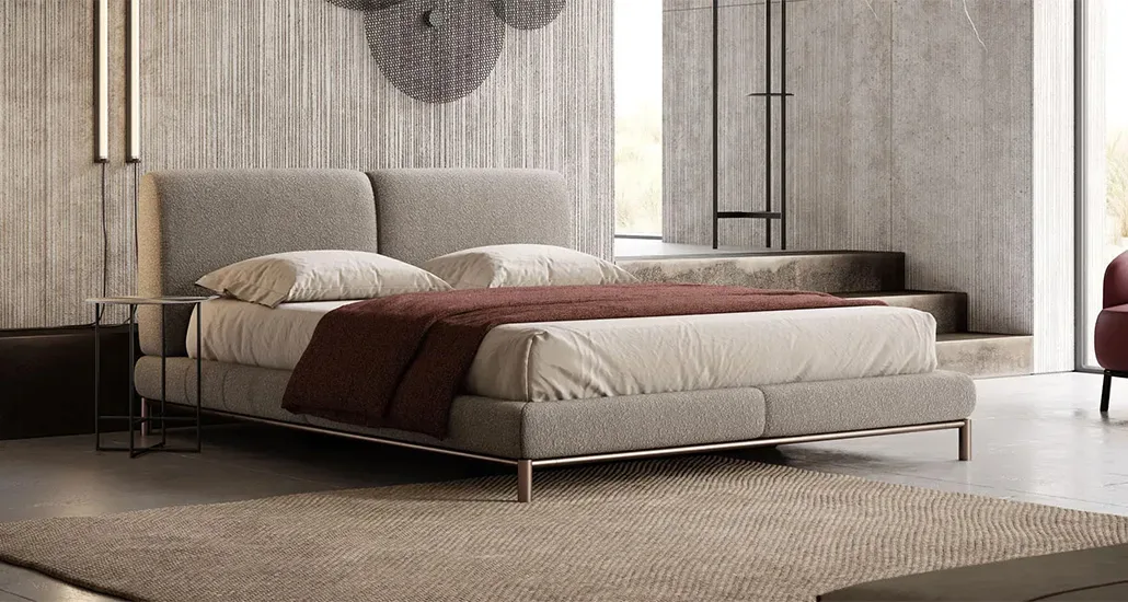 Margot bed is a contemporary double bed with steel base and upholstered frame and is suitable for hospitality and contract projects