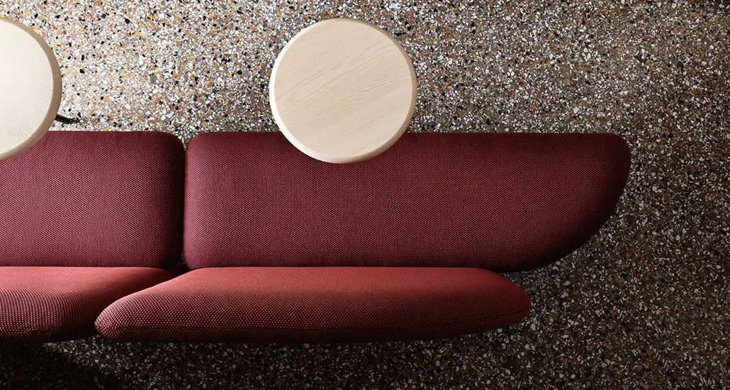 Marino modular bench with upholstery with round dining tables in front