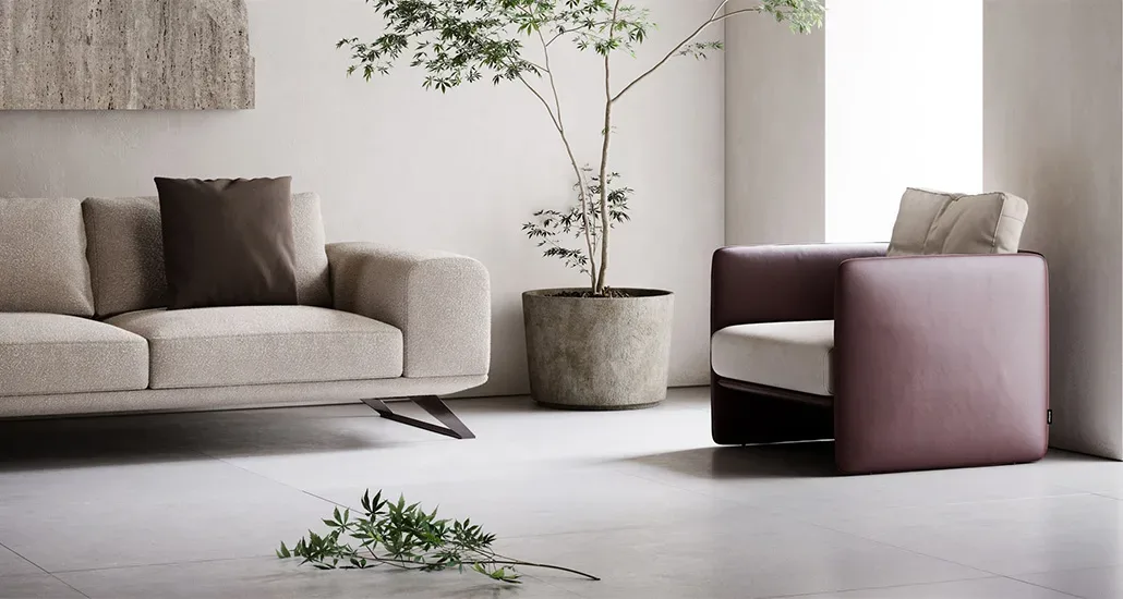 Miller armchair is a contemporary armchair upholsterd in leather or fabric and is suitable for hospitality and contract projects