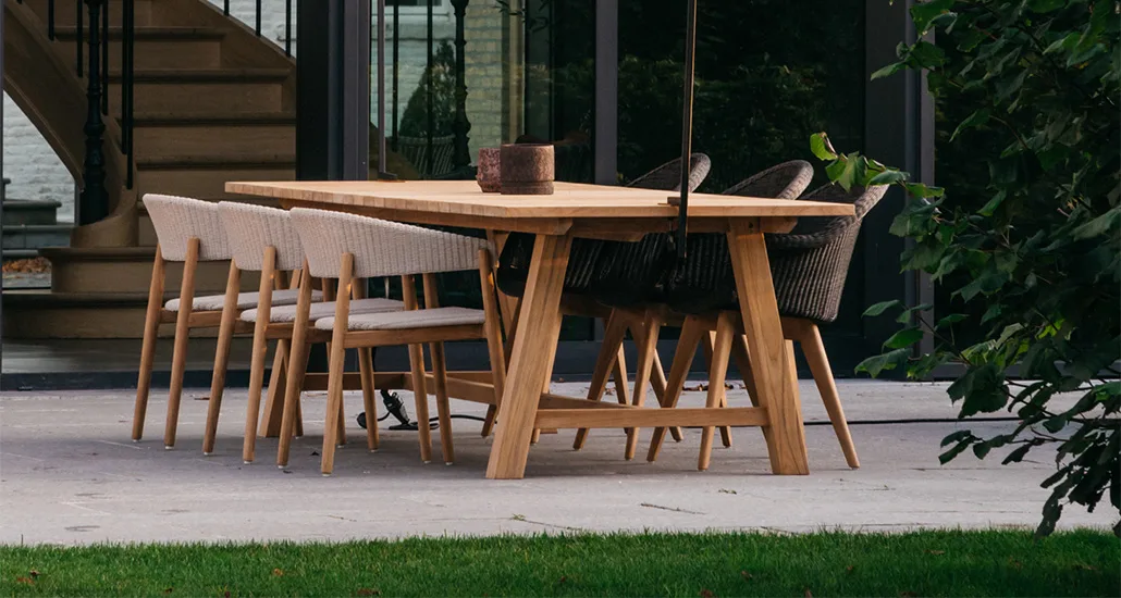 Mona Dining Chair is a contemporary outdoor dining chair with wicker and teak structure and is suitable for hospitality and contract projects