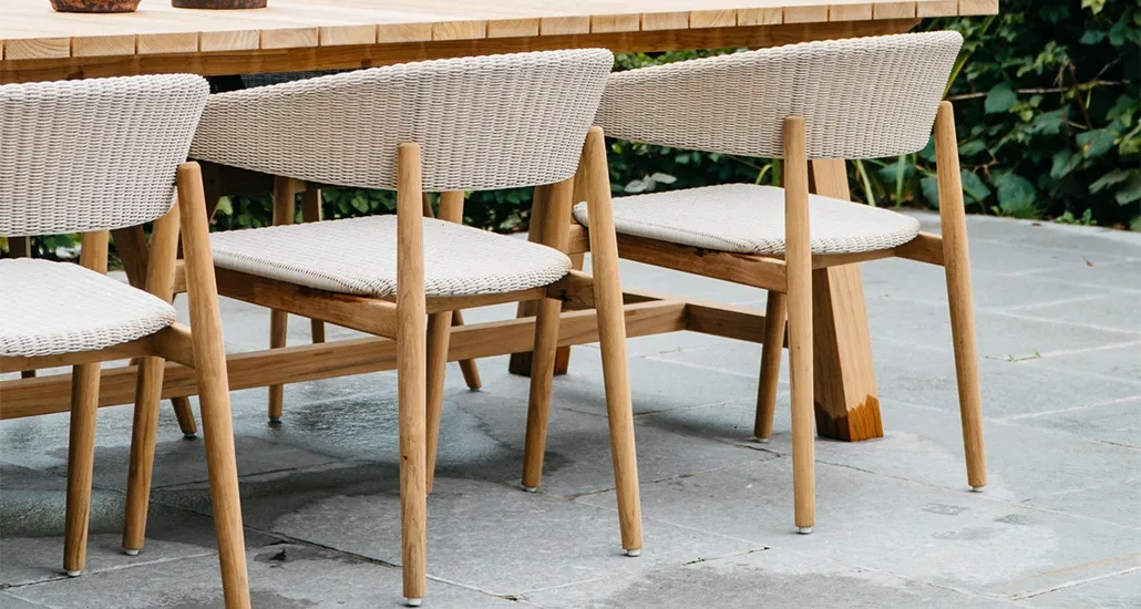 Mona Dining Chair is a contemporary outdoor dining chair with wicker and teak structure and is suitable for hospitality and contract projects