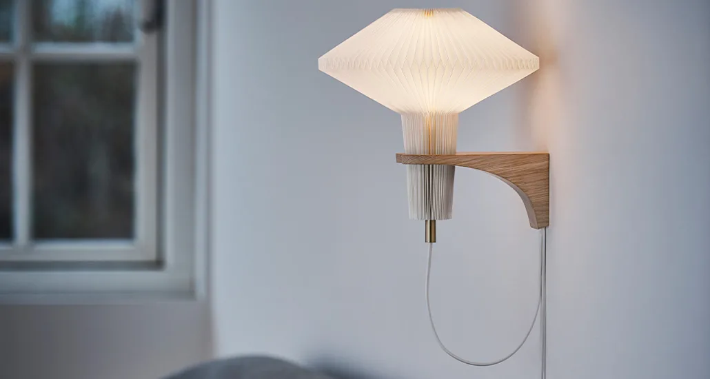 mushroom wall lamp is a contemporary wall lamp with plastic lampshade and oak structure and is best suitable for hospitality, contract and residential projects