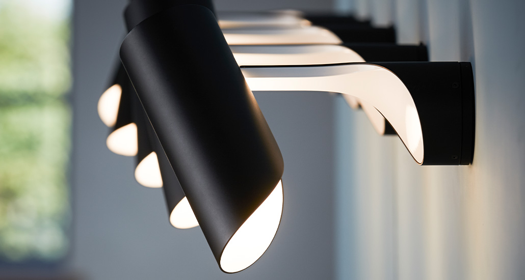 mutatio wall lamp is a contemporary led wall lamp made of steel body suitable for hospitality and residential settings