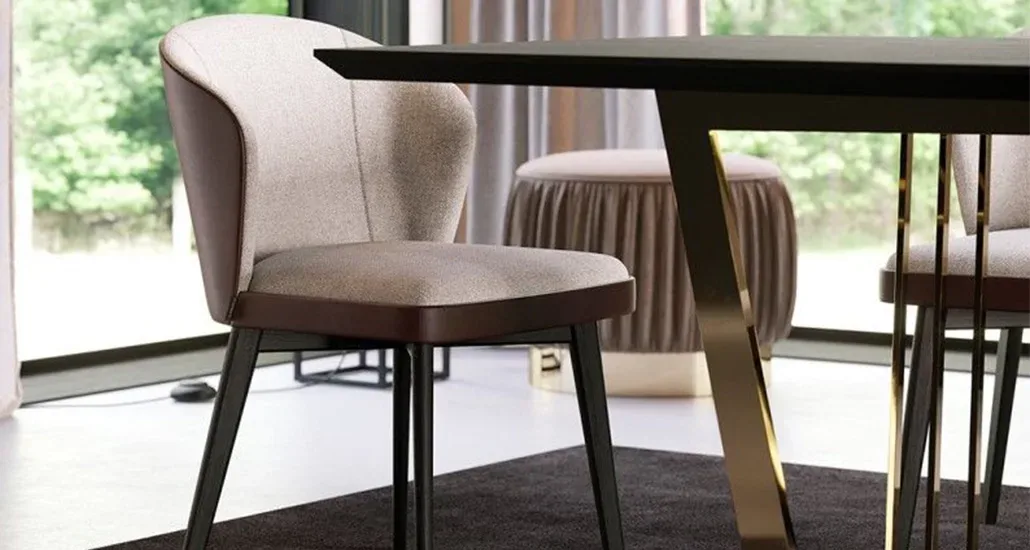 Nelly chair is a contemporary dining chair with leather upholstered back and is suitable for contract and hospitality projects