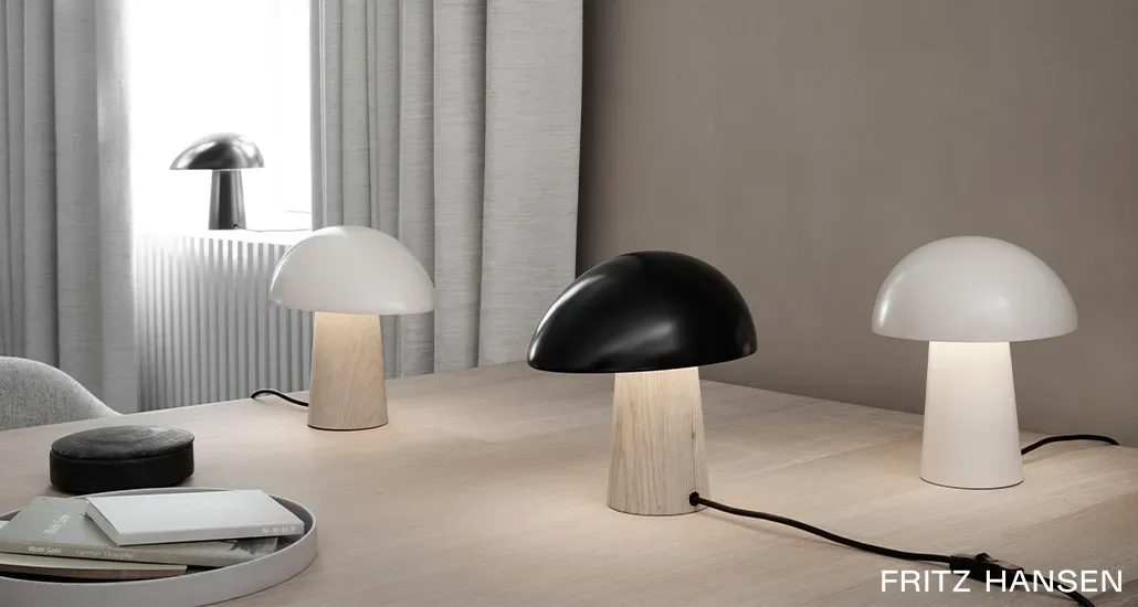Night owl table lamp by Fritz Hansen with different colors