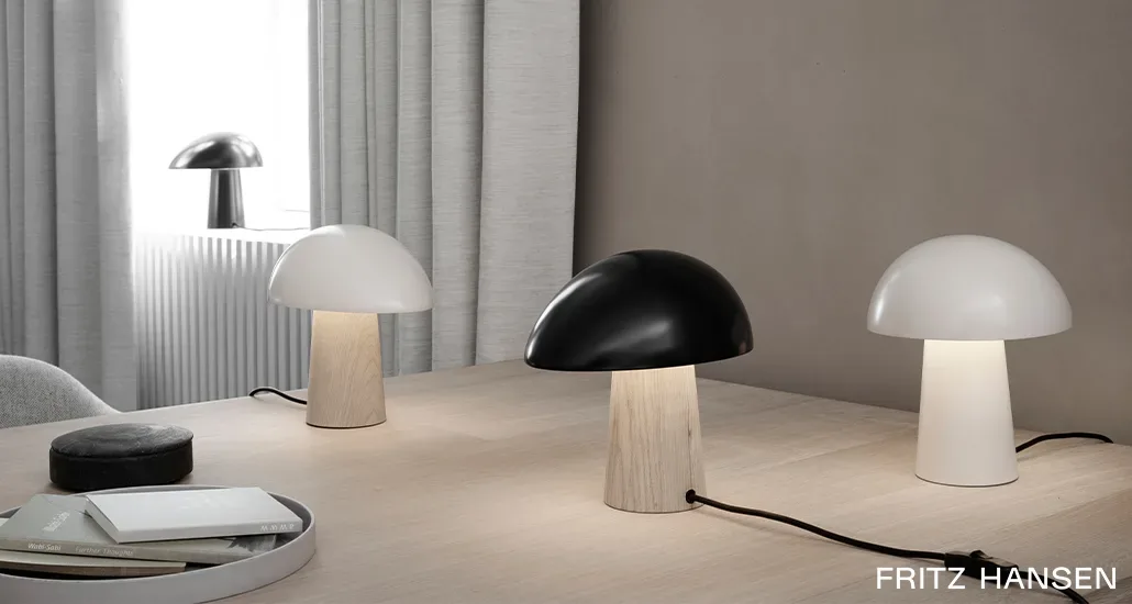 night owl table lamp by fritz hansen with different colors