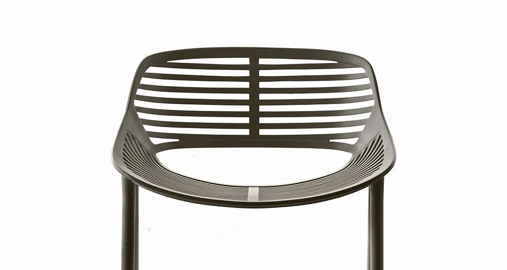 niwa barstool by fast is a barstool suitable for indoor and outdoor bar areas or patios.
