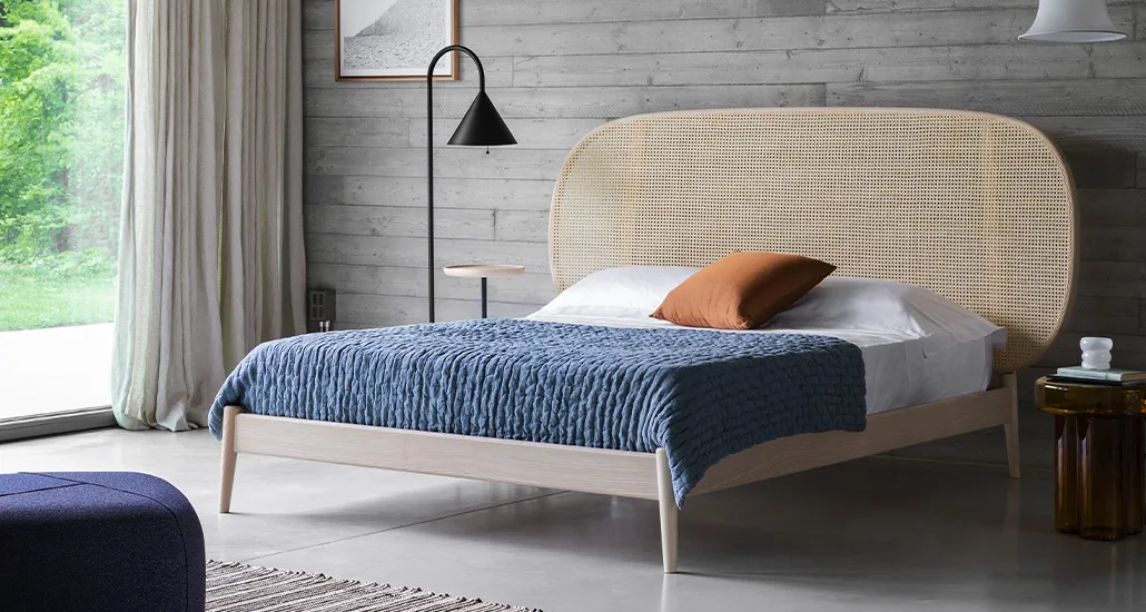 shiko wein bed is a contemporary king size bed with wood structure and vienna straw headboard. shiko is suitable for hospitality, residential and contract projects