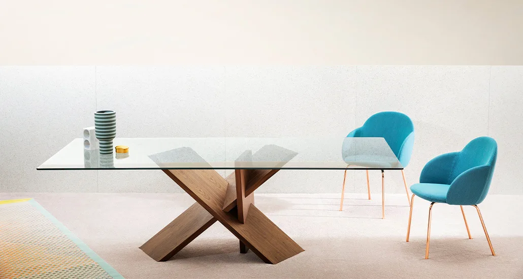 tripod table by miniforms is a contemporary dining table made of wood base and glass top suitable for hospitality, residential and contract spaces