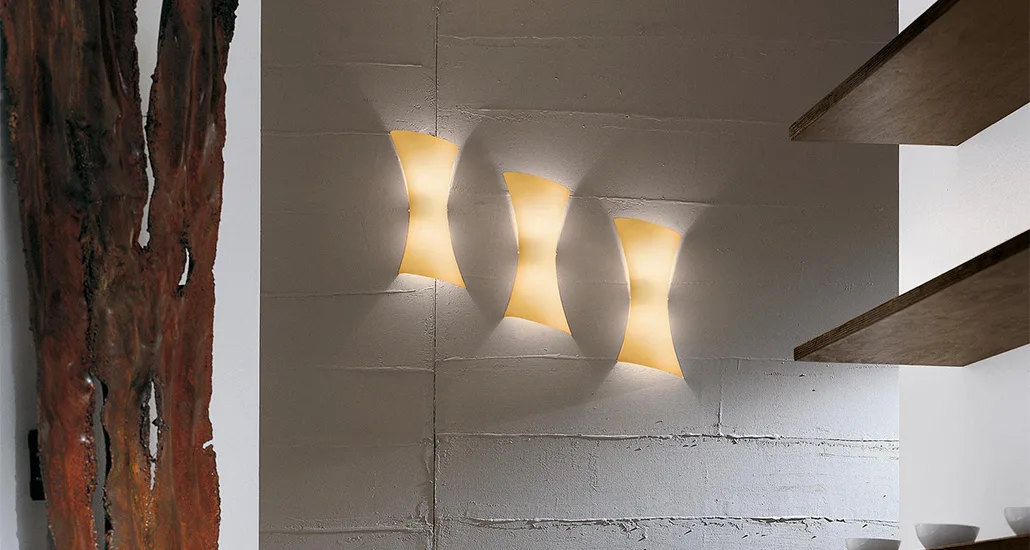 Twister wall lamp is a contemporary LED glass wall lamp suitable for hospitality and residential spaces