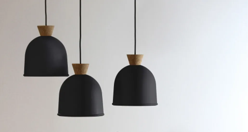 A closer look at three Vedra pendant lights, all in matte black. These lights can be used in hospitality and residential spaces