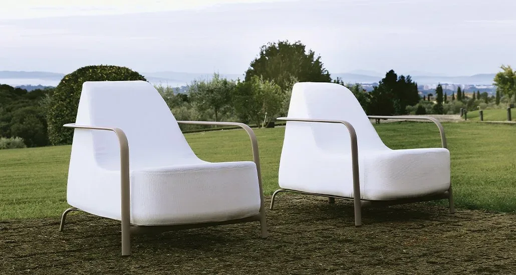 The bigfoot armchair on a grassy plain in the outdoo