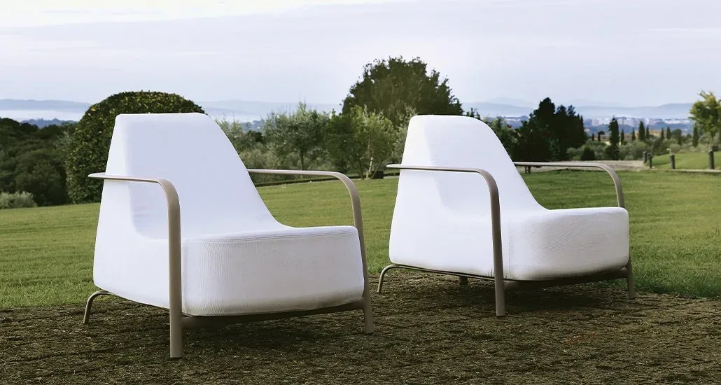 the bigfoot armchair on a grassy plain in the outdoo