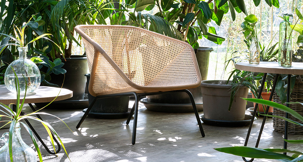Colony Armchair is a contemporary armchair with metal, wood and straw structure and is suitable for hospitality and contract projects