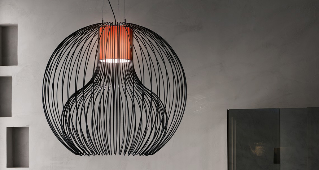 icaro ball pendant lamp by modo luce is a contemporary pendant lamp made of steel frame best suited for industrial, hospitality and contract settings