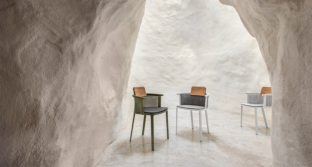 Nicolette dining armchair is a contemporary aluminium and teak outdoor dining armchair and is suitable for contract and hospitality spaces.