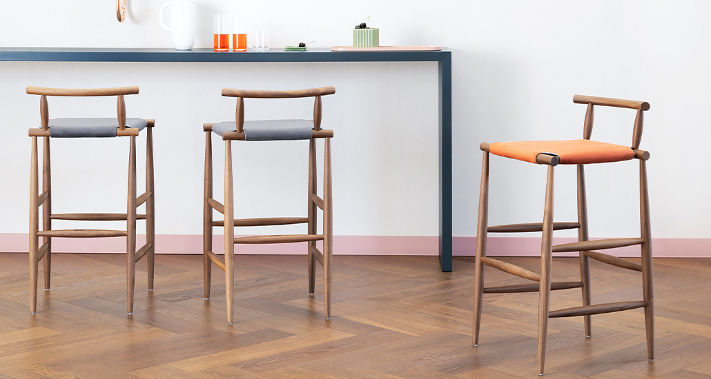 Pelleossa bar stool is a contemporary bar stool with oak and walnut with leather seat and hospitality and contract projects.