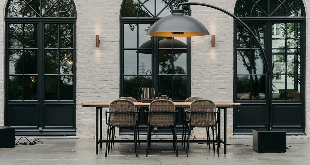 wicked dining table is a contemporary outdoor dining chair with oak top and aluminium base and is suitable for hospitality, contract and residential projects