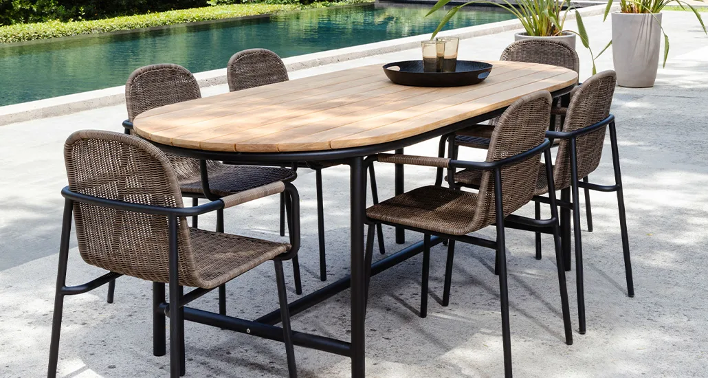wicked dining table is a contemporary outdoor dining chair with oak top and aluminium base and is suitable for hospitality, contract and residential projects