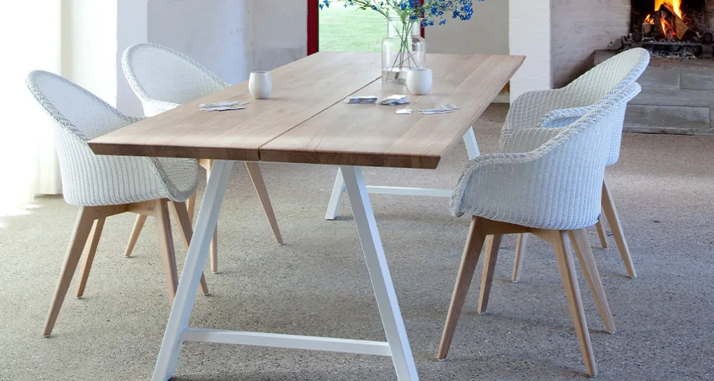 avril hb dining chair is a contemporary dining chair with lloyd loom seat, aluminium frame and oak base and is suitable for contract and hospitality projects.