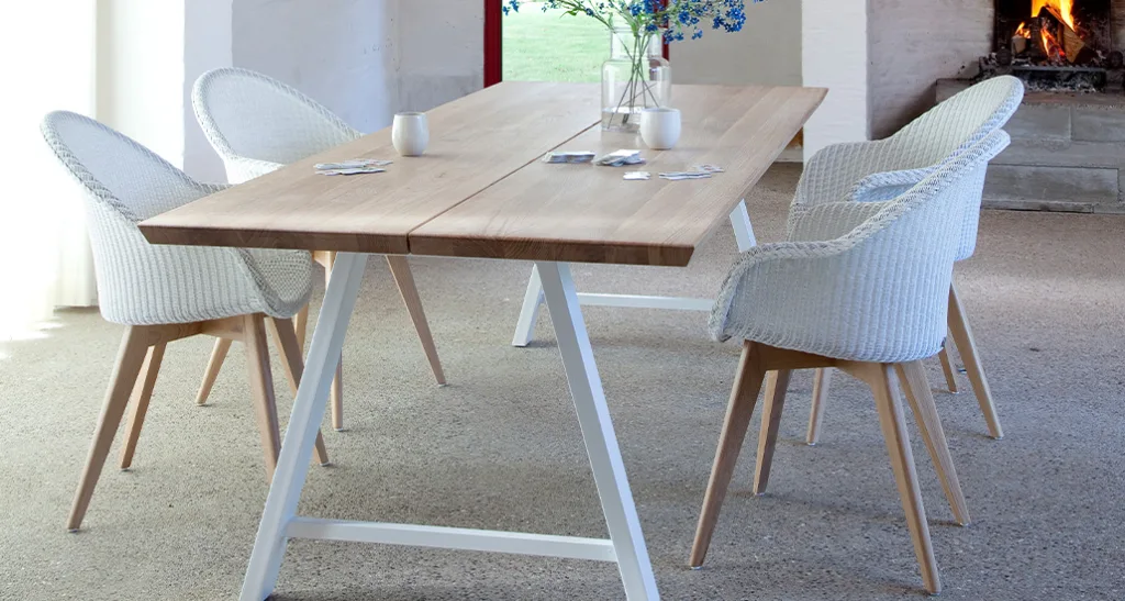 Avril hb dining chair is a contemporary dining chair with lloyd loom seat, aluminium frame and oak base and is suitable for contract and hospitality projects.