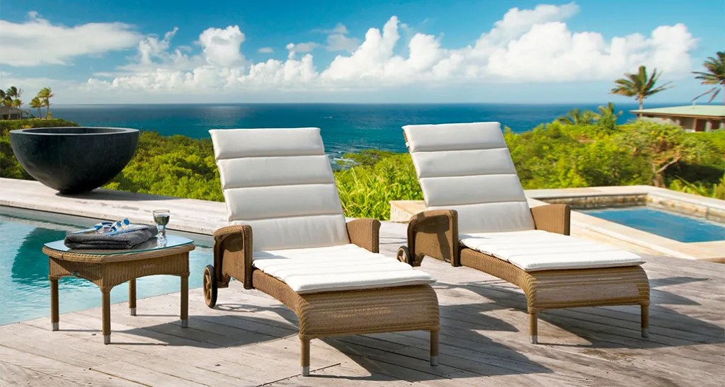 Dovile sunlounger with arms is a contemporary outdoor sunlounger with aluminium and lloyd loom structure and is suitable for hospitality and contract projects.