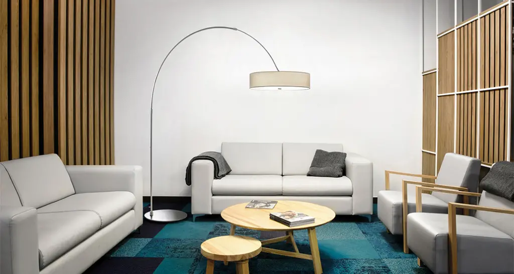 iris floor lamp a contemporary LED floor lamp with metal structure fabric lampshade is placed in contract hospitality space.