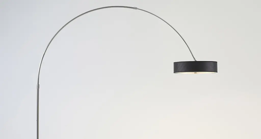 iris floor lamp a contemporary LED floor lamp with metal structure fabric lampshade is placed in contract hospitality space.