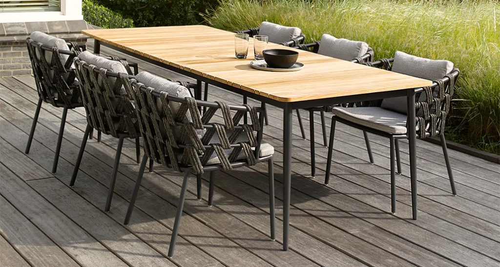 leo dining table is a contemporary outdoor dining table with teak top and aluminium base and is suitable for contract and hospitality spaces.