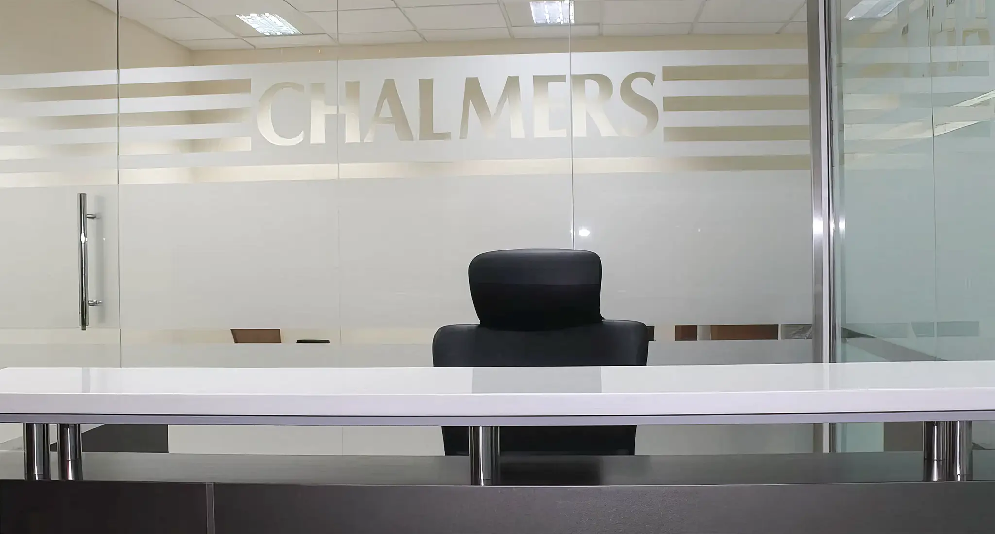 chalmers engineering co. (l.l.c.)'s office features cubicles and desks for a productive work environment.